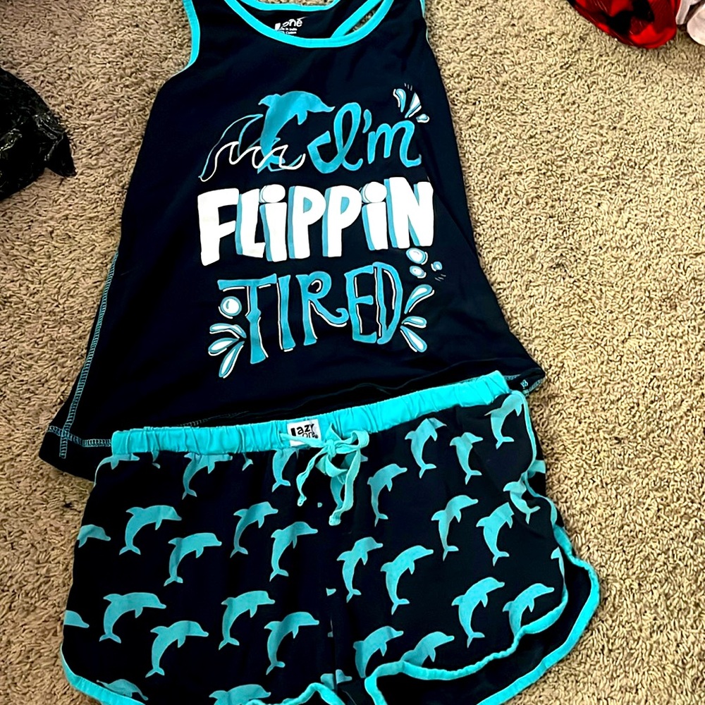 Dark blue and light blue “I’m flipping tired pajama set 1 is S and 2 is XS.